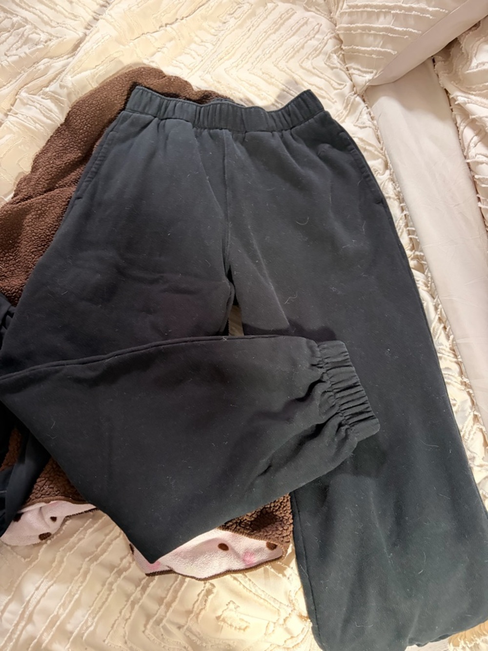 Three pairs of sweats